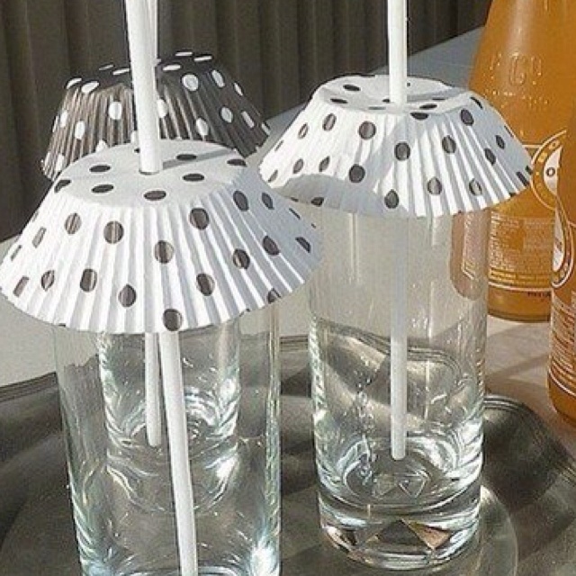 Put a straw through a cupcake liner to act as a lid for your drink to keep bugs out.