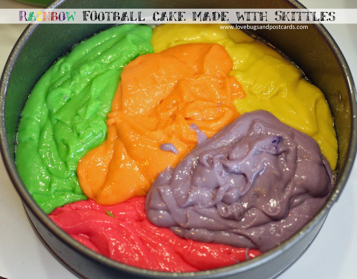 Football Rainbow cake made with Skittles for Super Bowl fun #MakeSB50Sweeter